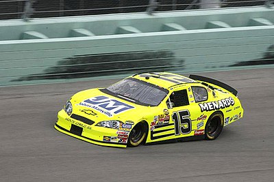 What is the name of the home improvement store chain founded by Paul Menard's father?