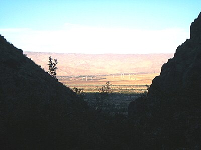 What is the name of the Native American tribe that owns reservation land within Palm Springs?