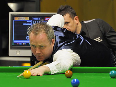 How long was John Higgins banned from professional competition in 2010?