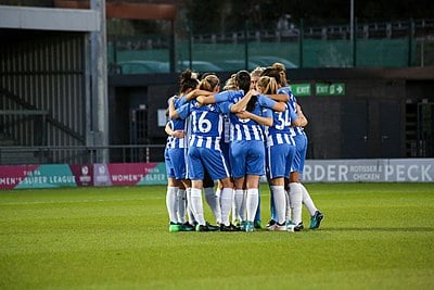Who scored the first-ever Women's Super League goal for Brighton & Hove Albion W.F.C.?
