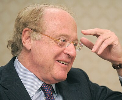 Which industry is Paolo Scaroni primarily known for?
