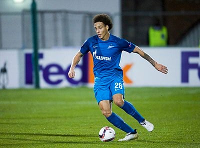 When did Witsel return to Europe with Borussia Dortmund?