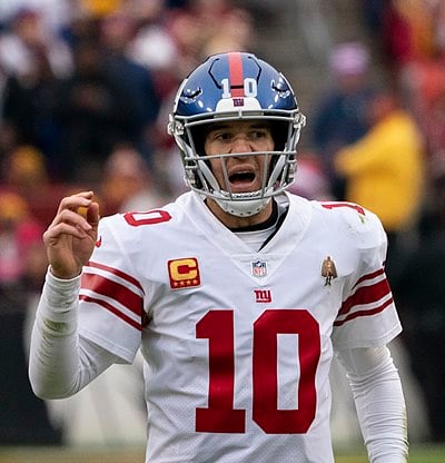 What is Eli Manning's all-time rank in passing yards?