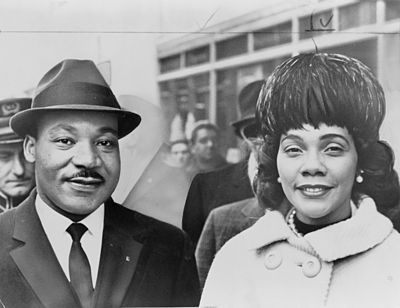 Where was Coretta temporarily buried before being interred next to her husband?