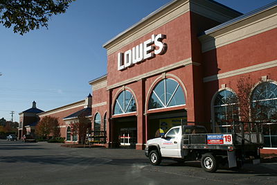In which year did The Home Depot surpass Lowe's in the US hardware chain ranking?