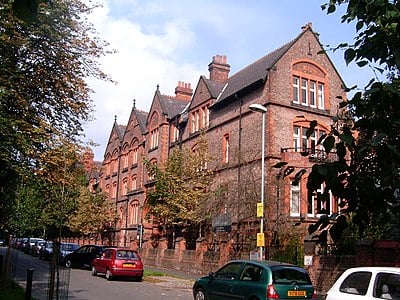 In which year was the Victoria University of Manchester founded as Owens College?