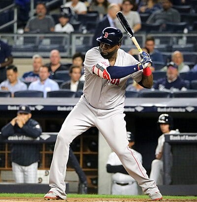 In his MLB debut, who did Ortiz play for?