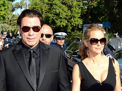 What type of aircraft is John Travolta known for owning and piloting?