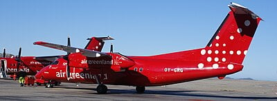 Which industry does Air Greenland support with charter services for tourists?