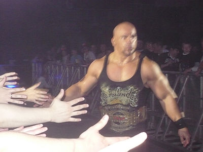How many times has Hernandez won the IWA World Tag Team Championship?
