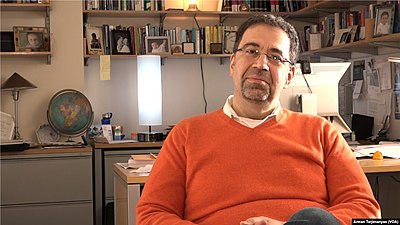 In what area did Acemoglu rank as the most cited economist in 2015?