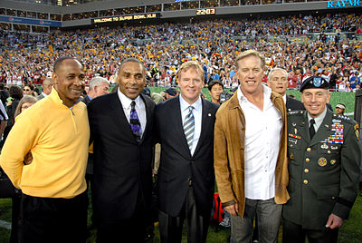 What title did Elway hold as an executive with the Broncos?