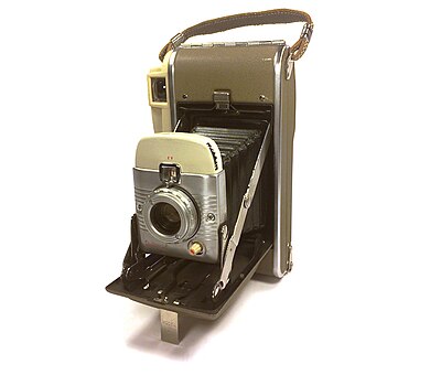 What was the primary purpose of Edwin H. Land's Polaroid polarizing polymer?