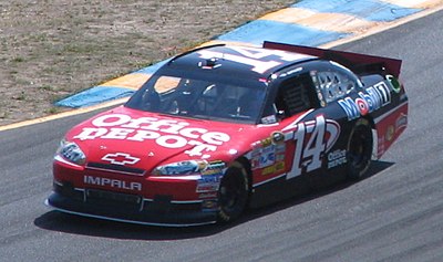 In which year did Tony Stewart win his first NASCAR Cup Series championship as an owner-driver?