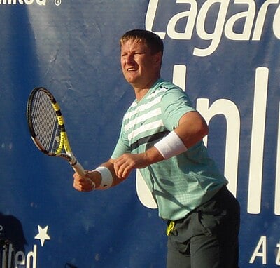 Who did Yevgeny Kafelnikov defeat to win his first Grand Slam singles title at the 1996 French Open?