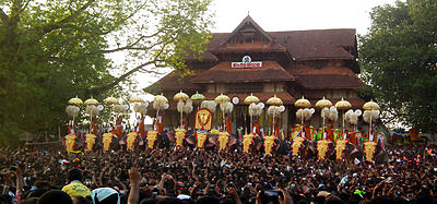 In which direction is Thrissur located from the state capital, Thiruvananthapuram?