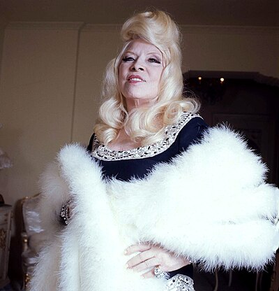 In which entertainment genre did Mae West start her career?