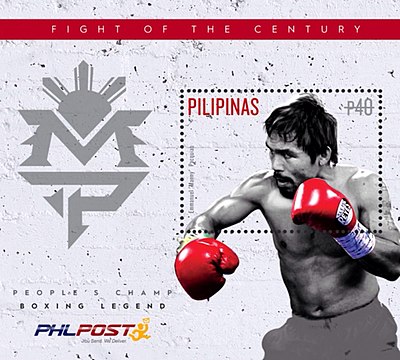 How many decades has Manny Pacquiao held world championships across?