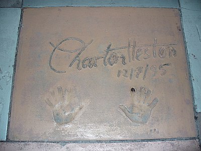 Which organization did Charlton Heston serve as a five-term president?