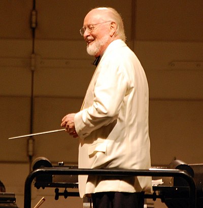 What was John Williams' first film as a composer?