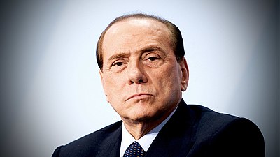 What institutions did Silvio Berlusconi attend for their education?