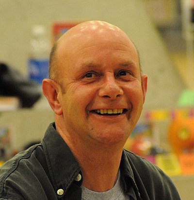 What common themes does Nick Hornby explore in his work?