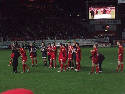 In which year did SK Brann win their first Norwegian Football Cup?