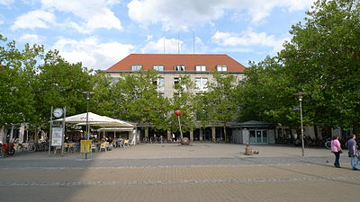 What is the name of Erlangen's main train station?