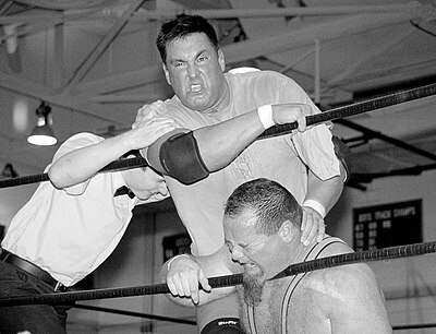 Who inducted Neidhart into the George Tragos/Lou Thesz Hall of Fame?