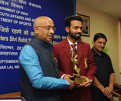 In which trophy did Rahane make his Test debut?