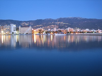 What is the distance of Volos from Athens?