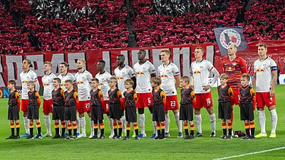 In which tier of German football did RB Leipzig begin their journey?