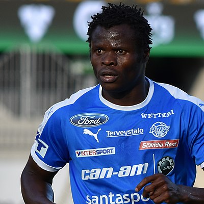 What position does Taye Taiwo play in football?