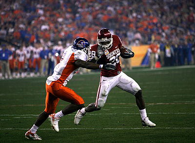 What was Adrian Peterson's rushing record during his freshman year at Oklahoma?