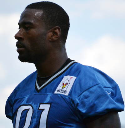 Which Detroit Lions player holds the NFL record for most receiving yards in a single season?