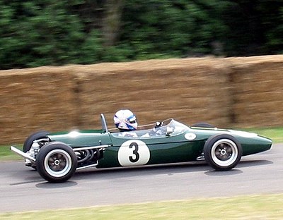 Which major racing event did Brabham compete in with Cooper?