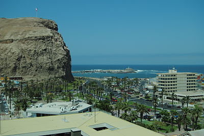 What is the geographical feature that Arica is located at?