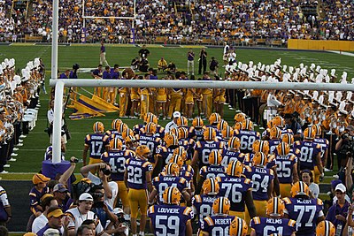 What is the maximum number of people that can be present at [url class="tippy_vc" href="#4784157"]Tiger Stadium[/url], the home of LSU Tigers Football?