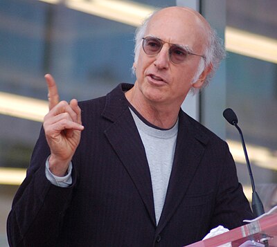 Larry David performed impersonations on SNL of which political figure?