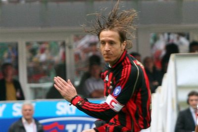 What position did Massimo Ambrosini primarily play?