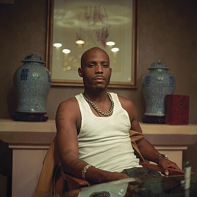 Which year did DMX release his debut album, "It's Dark and Hell Is Hot"?