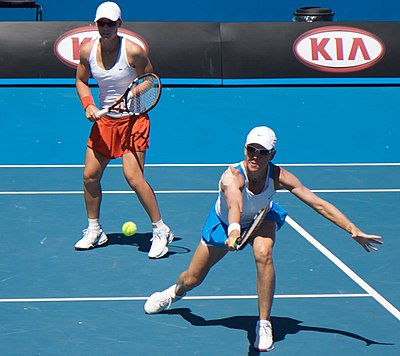 Which player did Stosur partner to win the 2014 Wimbledon mixed doubles?