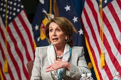 What is the religion or worldview of Nancy Pelosi?