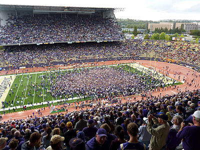 In which NCAA Division does Washington Huskies football compete?