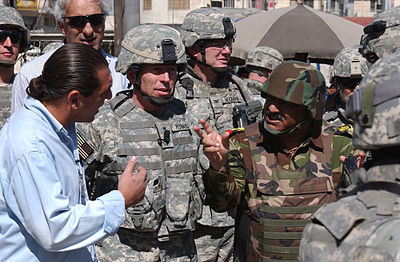 In which year did David Petraeus retire from the U.S. Army?