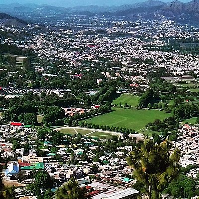 Which British officer replaced Haripur as Hazara's capital with Abbottabad?
