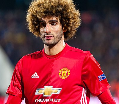 What was Fellaini's jersey number in Manchester United?