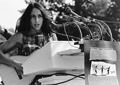 In which decade did Joan Baez achieve gold record status for her first three albums?