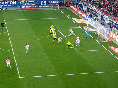 In which city is FC Augsburg's stadium, WWK ARENA, located?
