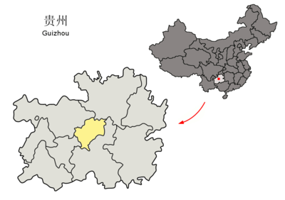 What plateau is Guiyang situated on the east of?